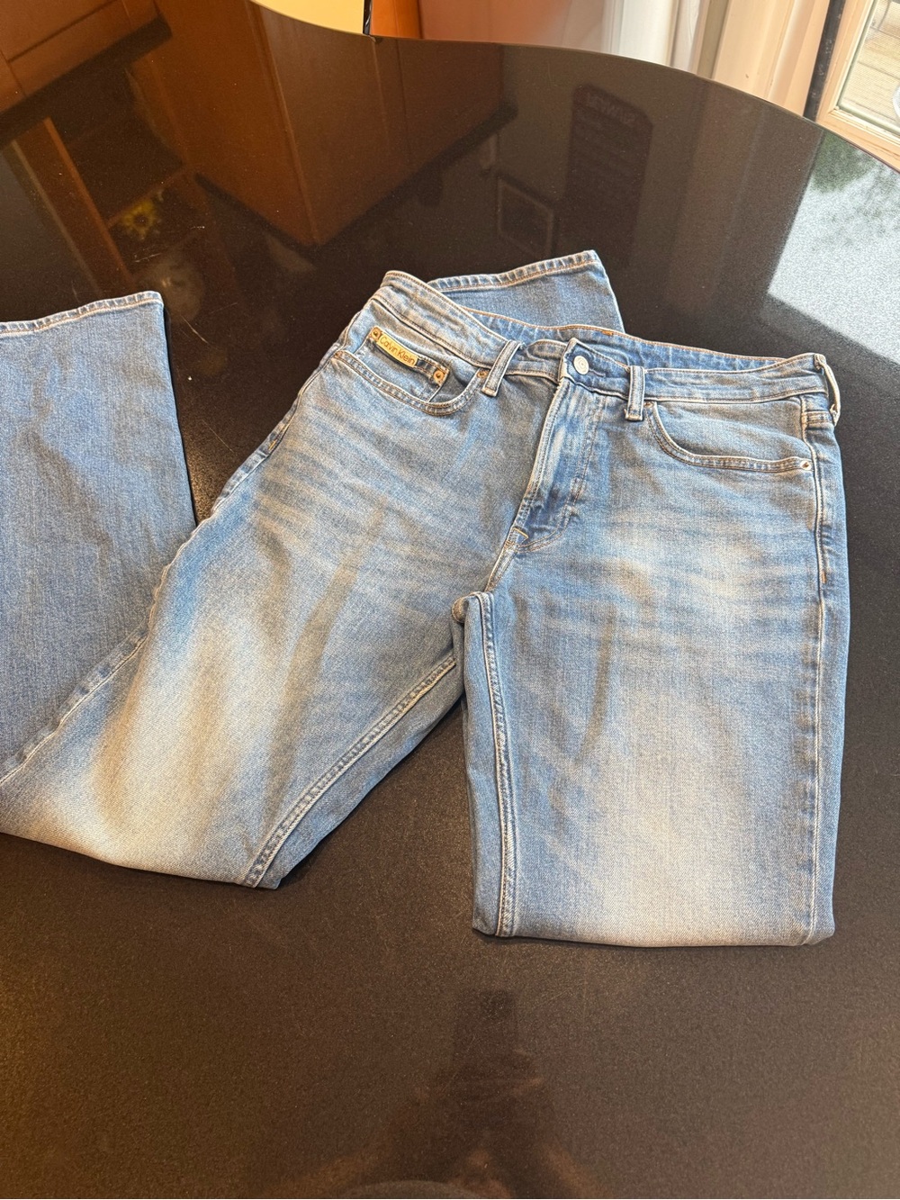 Calvin Klein Medium Blue Denim Jeans with Red Logo Tag